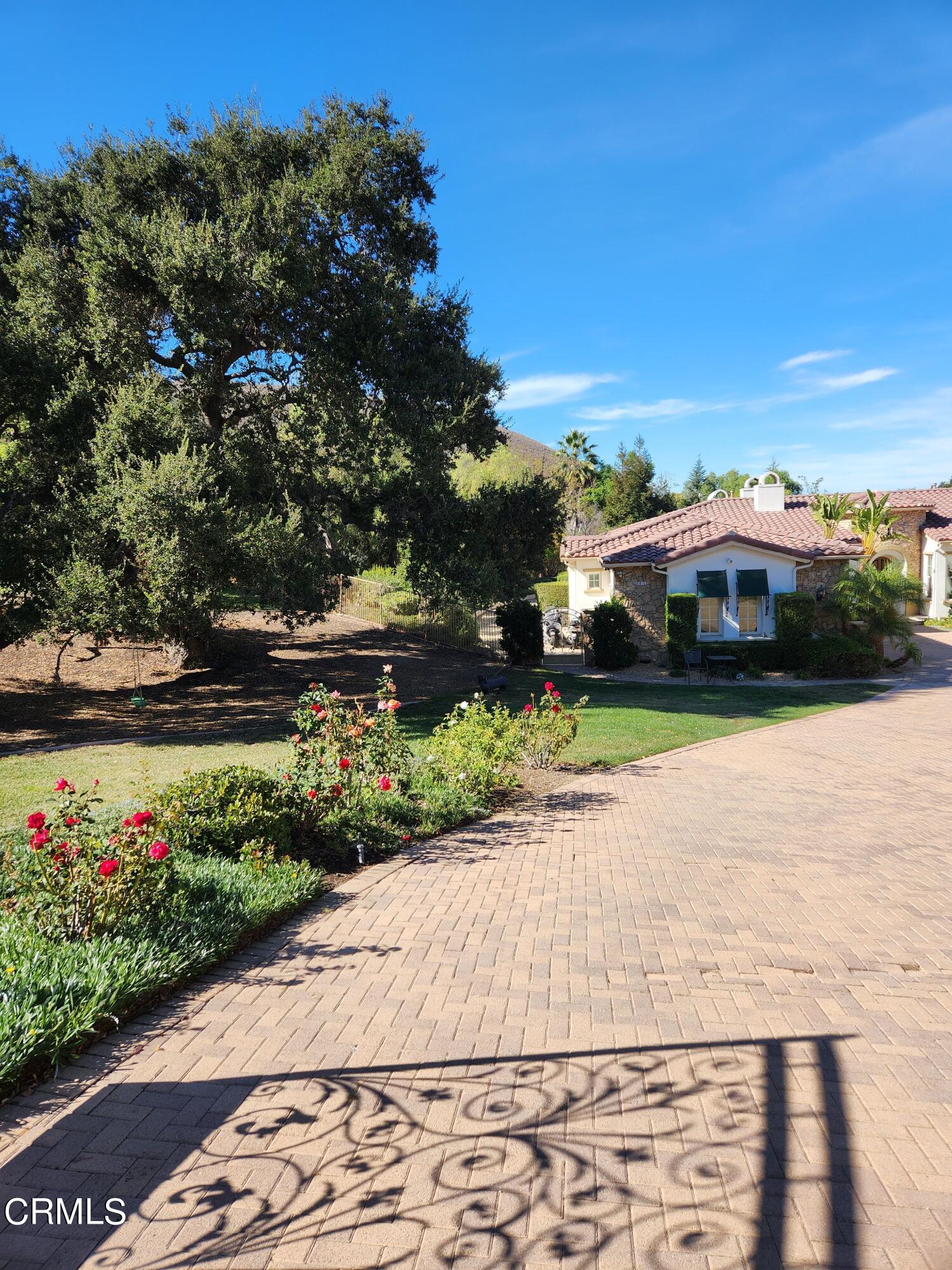1915 Maya Pradera Lane Moorpark, CA 93021 - Photo 15 of 39 a view of street with flower on it