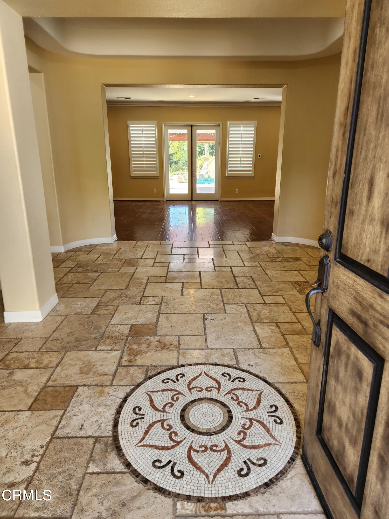 1915 Maya Pradera Lane Moorpark, CA 93021 - Photo 17 of 39 a view of a entryway door of the house
