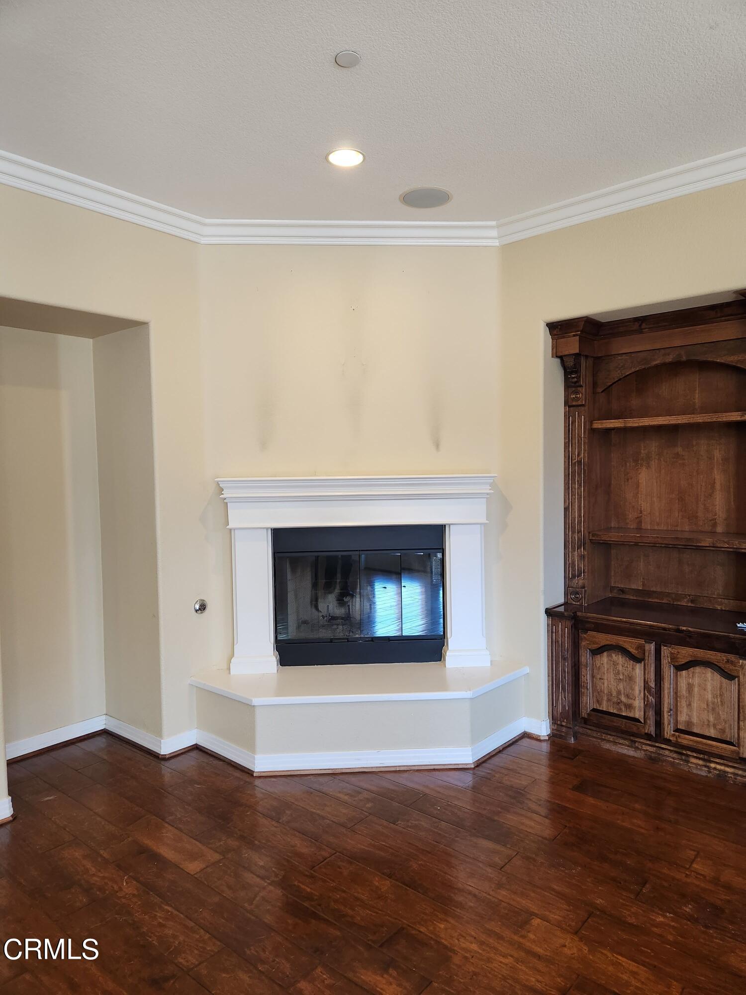 1915 Maya Pradera Lane Moorpark, CA 93021 - Photo 28 of 39 a living room with a fireplace