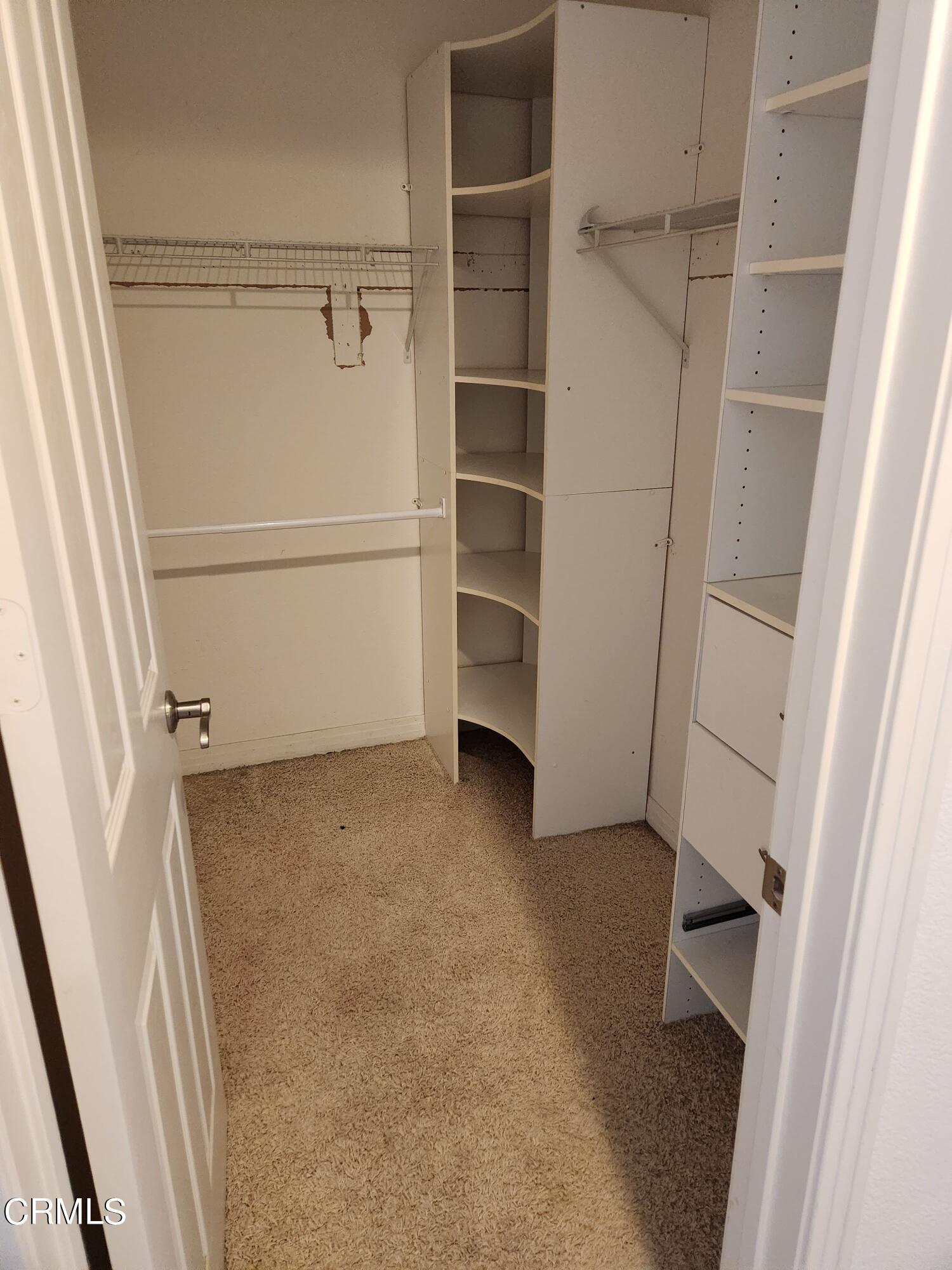1915 Maya Pradera Lane Moorpark, CA 93021 - Photo 35 of 39 a view of walk in closet with empty racks