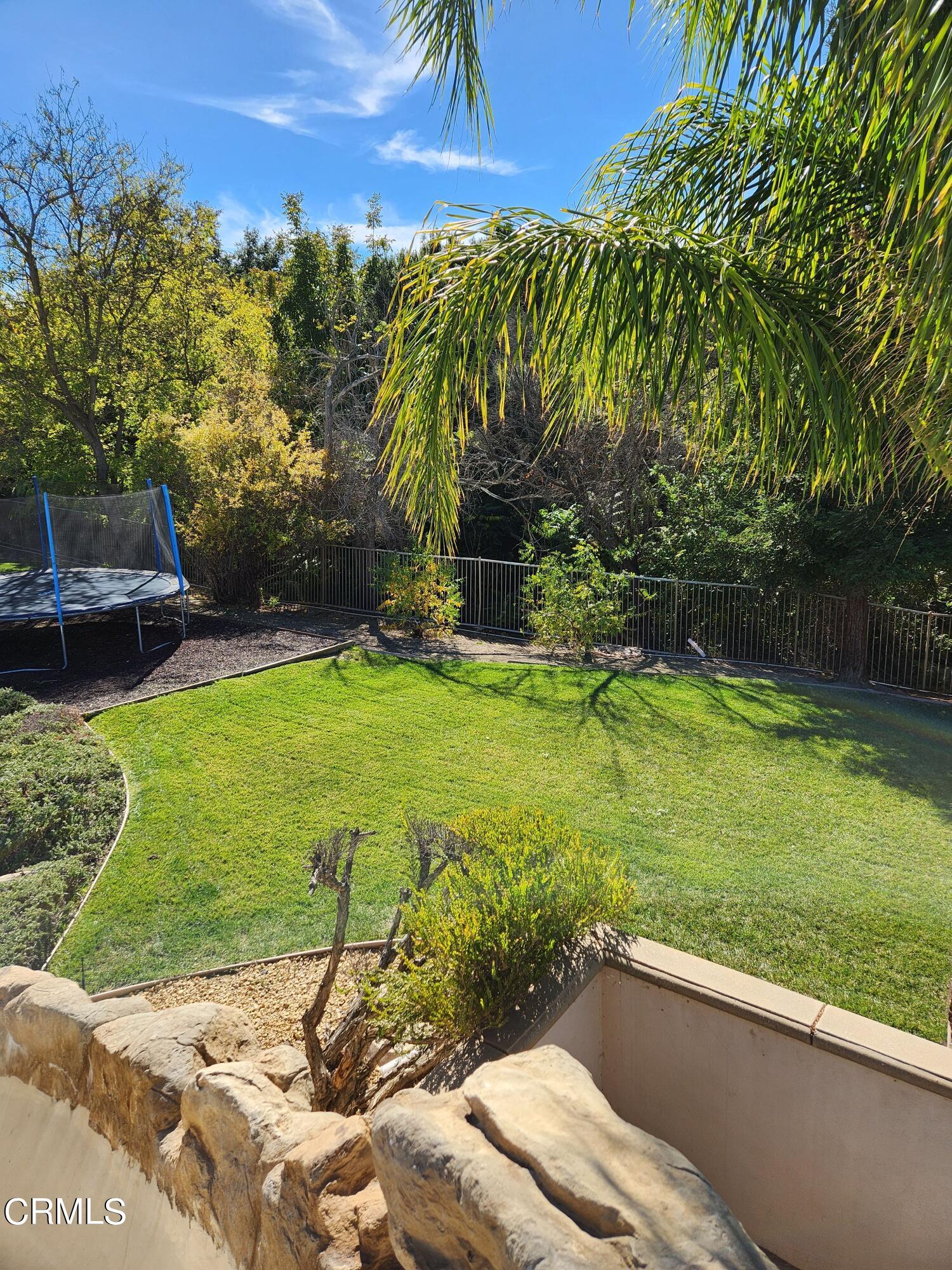 1915 Maya Pradera Lane Moorpark, CA 93021 - Photo 7 of 39 a view of a backyard with sitting area