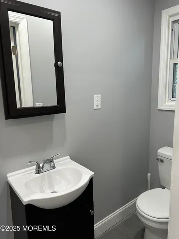a bathroom with a sink and a toilet