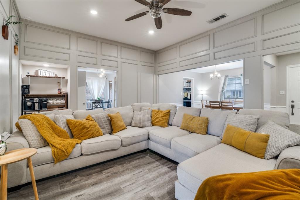 7214 Ridgeview Drive Rowlett, TX 75089 - Photo 5 of 23 a view of a living room kitchen and a wooden floor