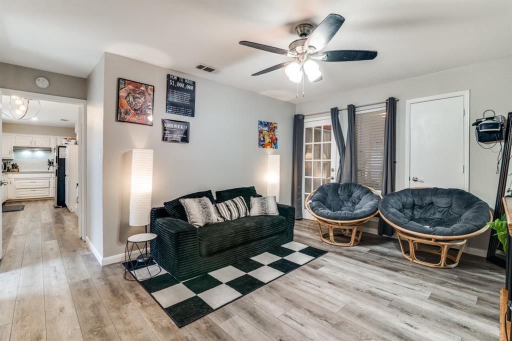 7214 Ridgeview Drive Rowlett, TX 75089 - Photo 10 of 23 a living room with furniture and a wooden floor