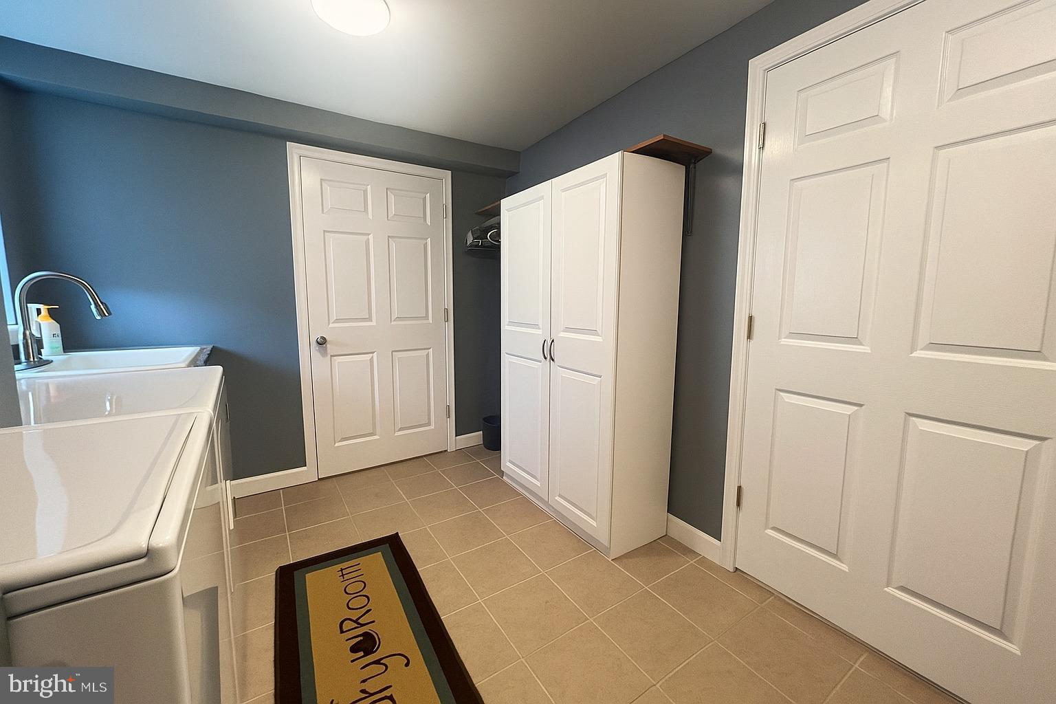 1204 Vilsmeier Road Lansdale, PA 19446 - Photo 11 of 26 Modern laundry room with sleek design.