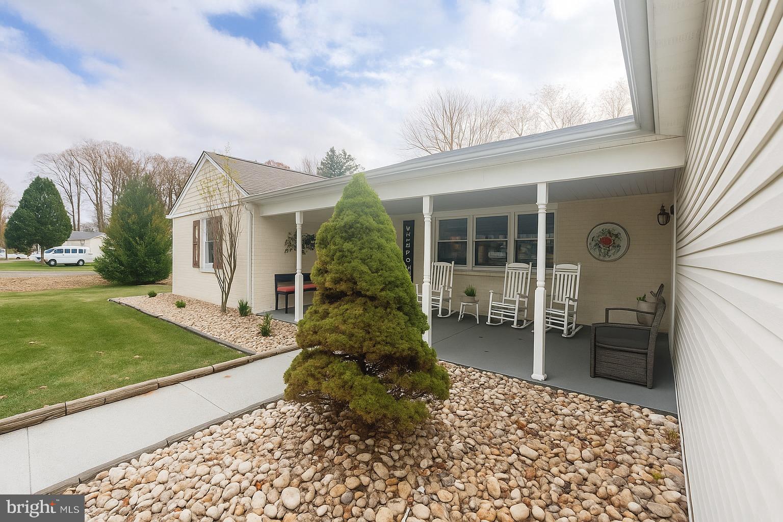 1204 Vilsmeier Road Lansdale, PA 19446 - Photo 2 of 26 Charming porch with serene landscaping.