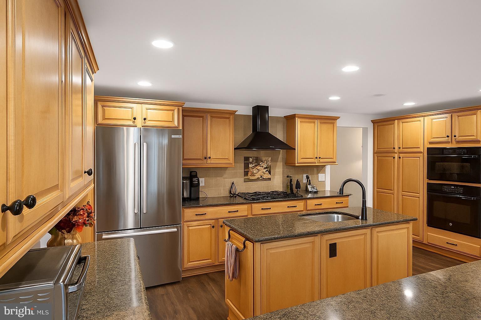 1204 Vilsmeier Road Lansdale, PA 19446 - Photo 5 of 26 Warm wood tones in a modern kitchen space.