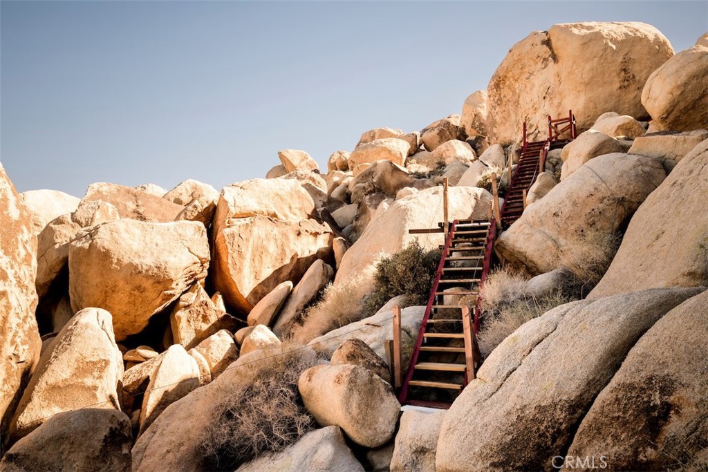 66075 Foothill Drive Joshua Tree, CA 92252 - Photo 49 of 53 a view of a couch in a bed