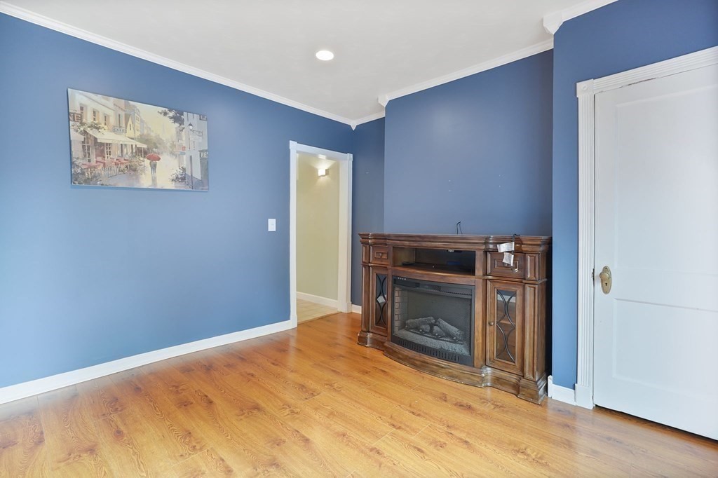86 Lincoln Road Longmeadow, MA 01106 - Photo 10 of 42 a view of empty room with a fireplace