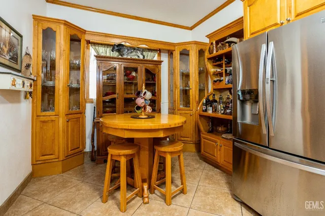 a bedroom with a bed and a night stand