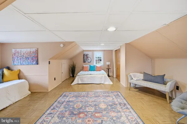 a bed room with a bed and a couch