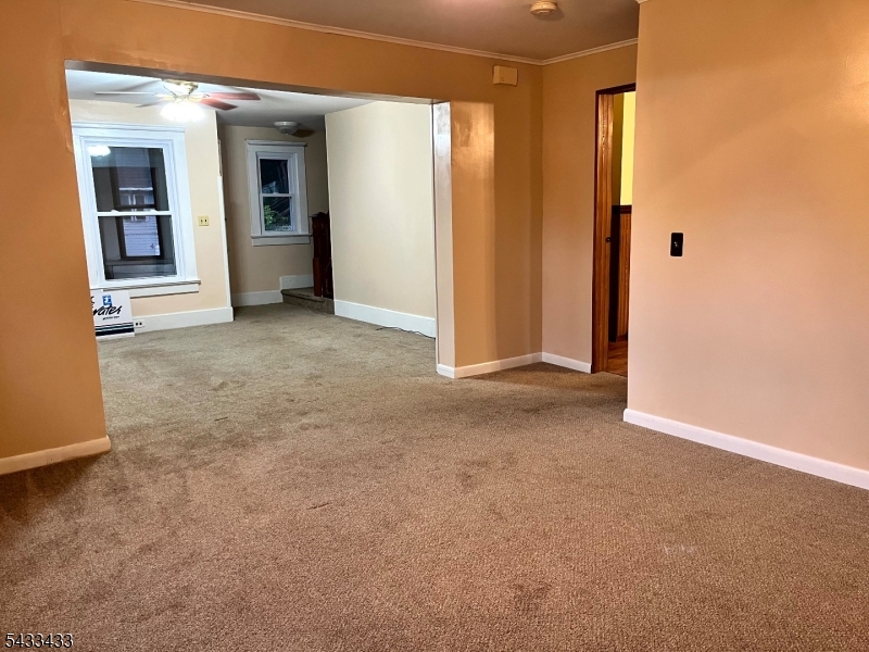 30 Fowler Street Franklin, NJ 07416 - Photo 12 of 27 an empty room with closet and windows