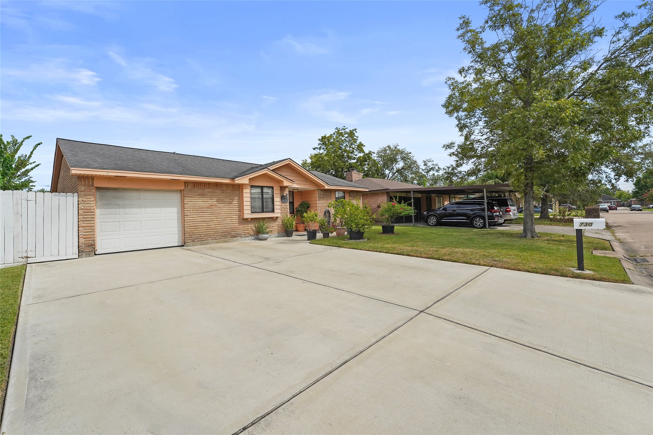 730 Stonyridge Street Channelview, TX 77530 - Photo 2 of 26 front view of house with a yard