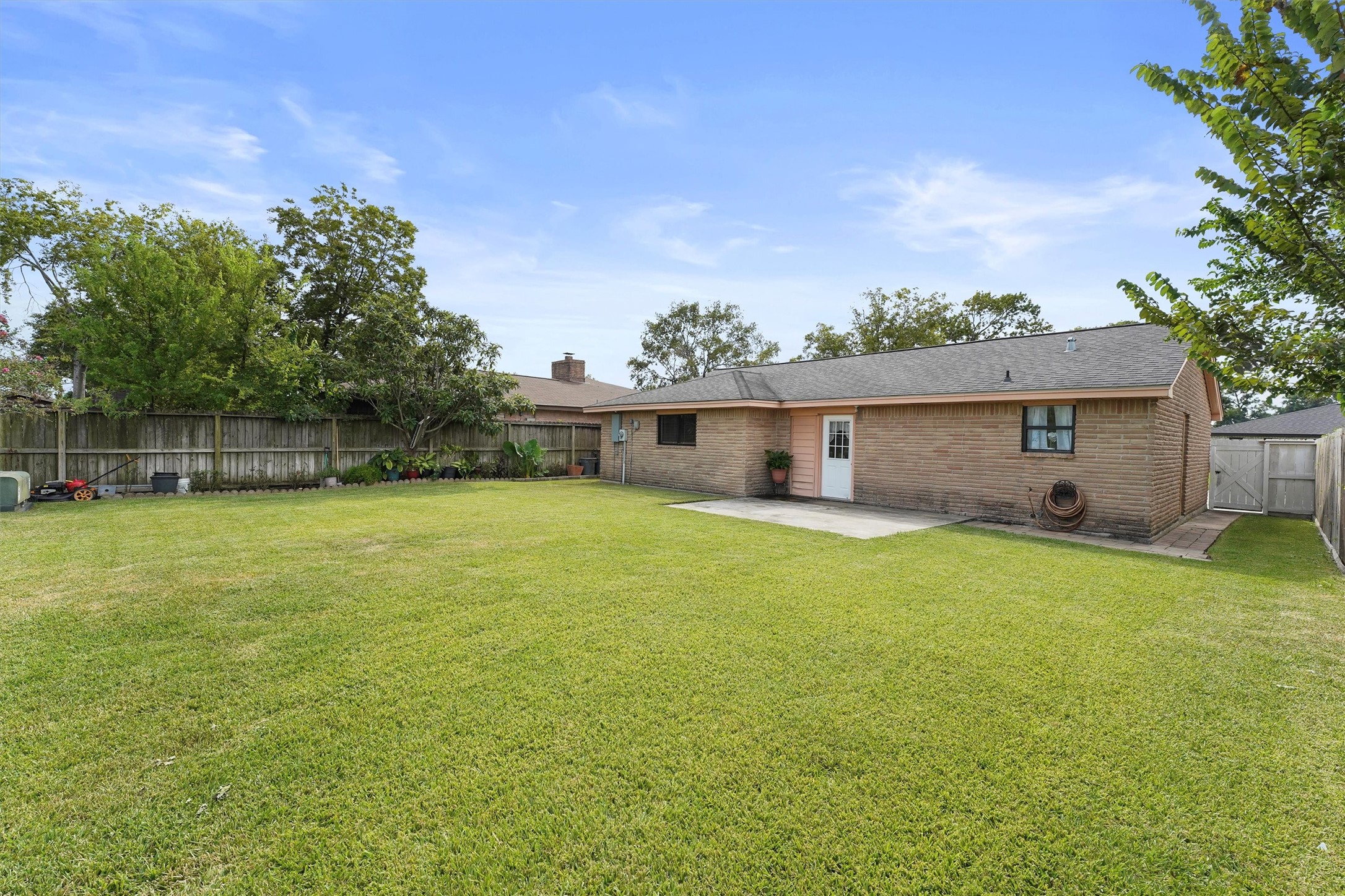 730 Stonyridge Street Channelview, TX 77530 - Photo 25 of 26 front view of a house with a yard