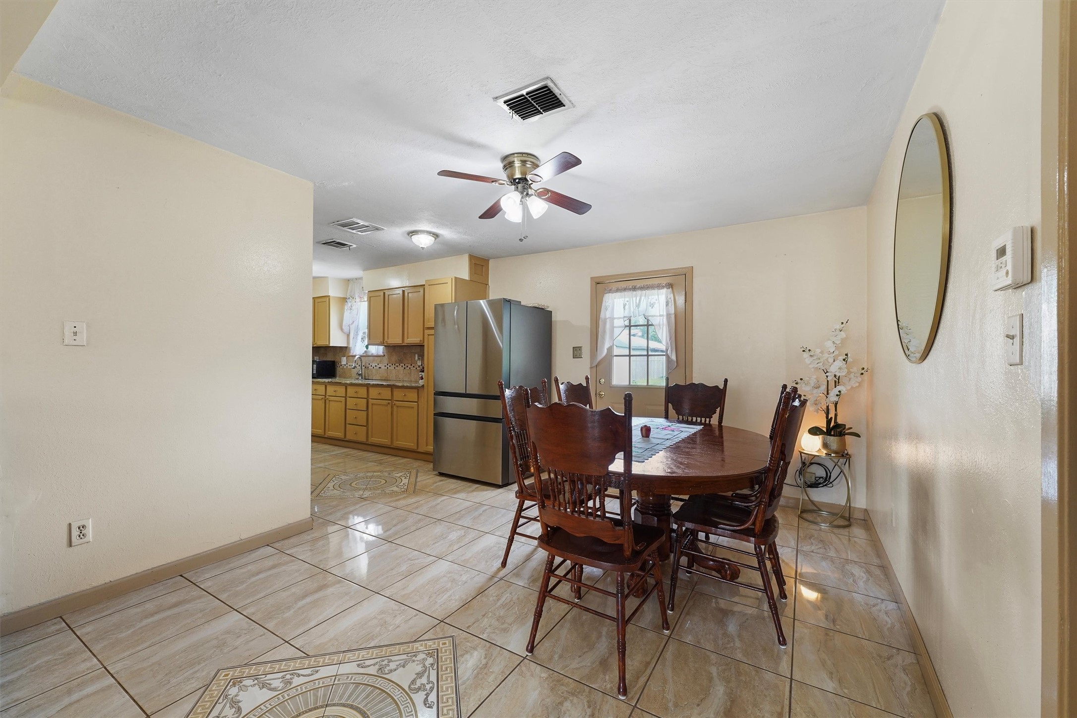 730 Stonyridge Street Channelview, TX 77530 - Photo 10 of 26 a view of a dining room with furniture