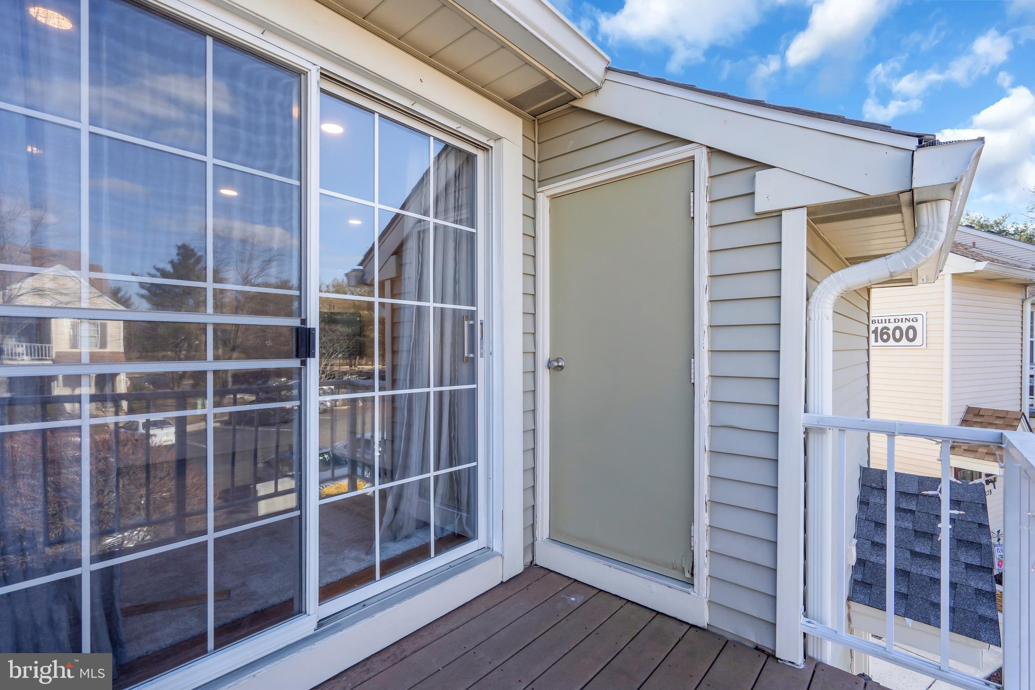 1508 B Ralston Drive Mount Laurel, NJ 08054 - Photo 29 of 29 a view of a wooden door and a window