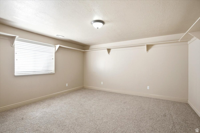 1089 West 2325th Street North Layton, UT 84041 - Photo 29 of 40 Neutral-toned room featuring a single window with horizontal blinds, light-colored carpet flooring, and a ceiling-mounted light fixture
