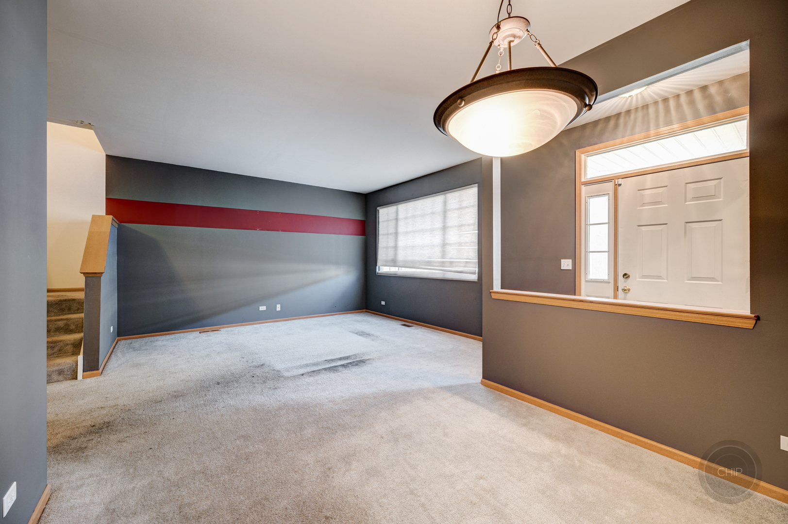 752 County Line Road Aurora, IL 60502 - Photo 11 of 30 a view of empty room with window and fireplace