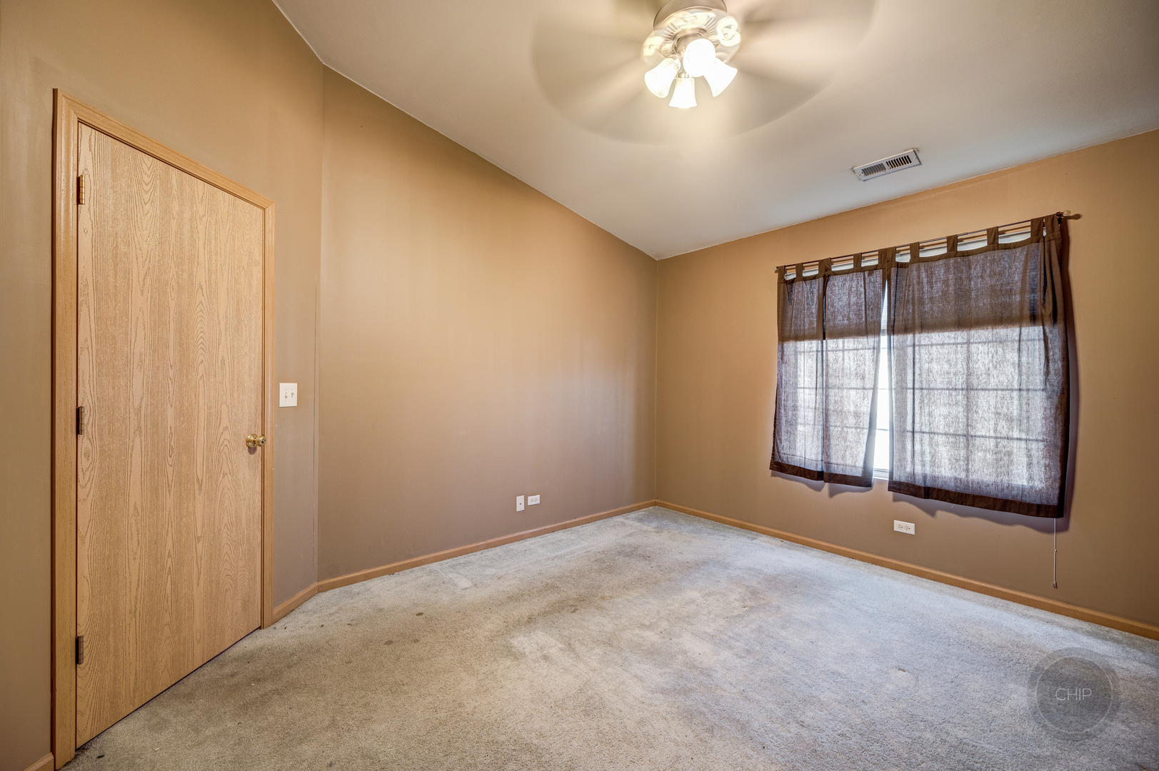 752 County Line Road Aurora, IL 60502 - Photo 20 of 30 a view of an empty room with a window