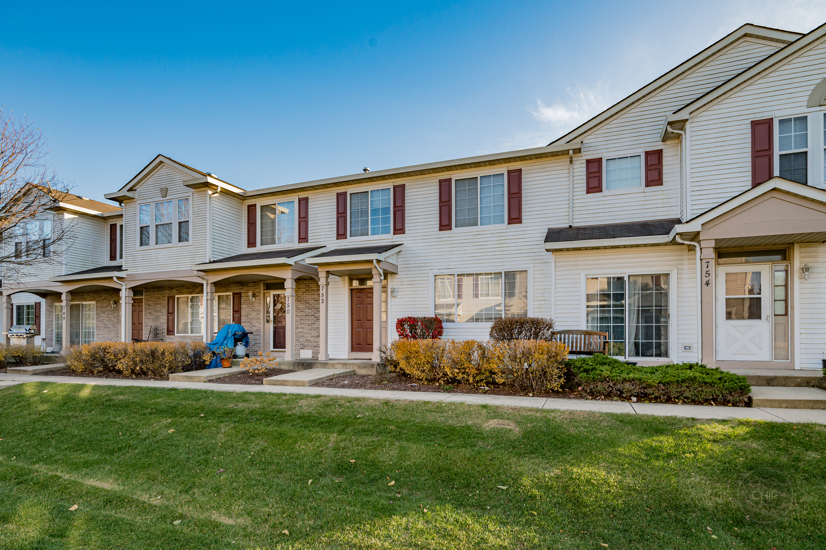 752 County Line Road Aurora, IL 60502 - Photo 26 of 30 a front view of a house with a yard