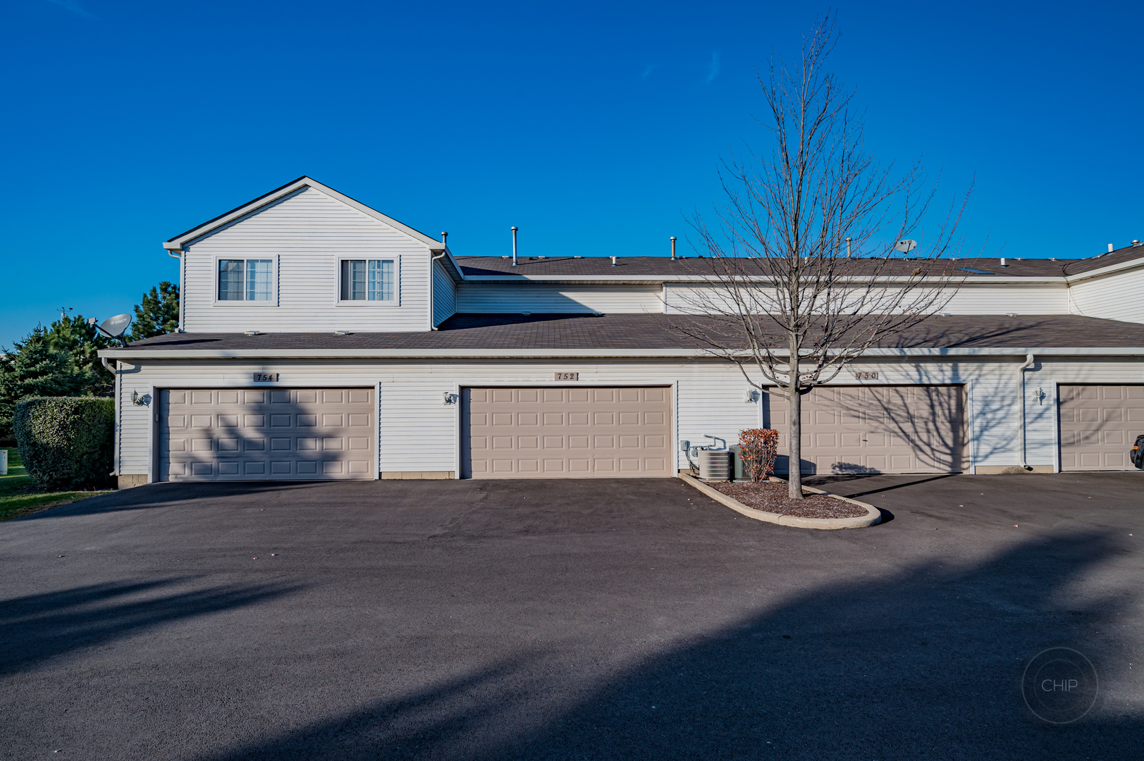 752 County Line Road Aurora, IL 60502 - Photo 29 of 30 a view of a house with a patio