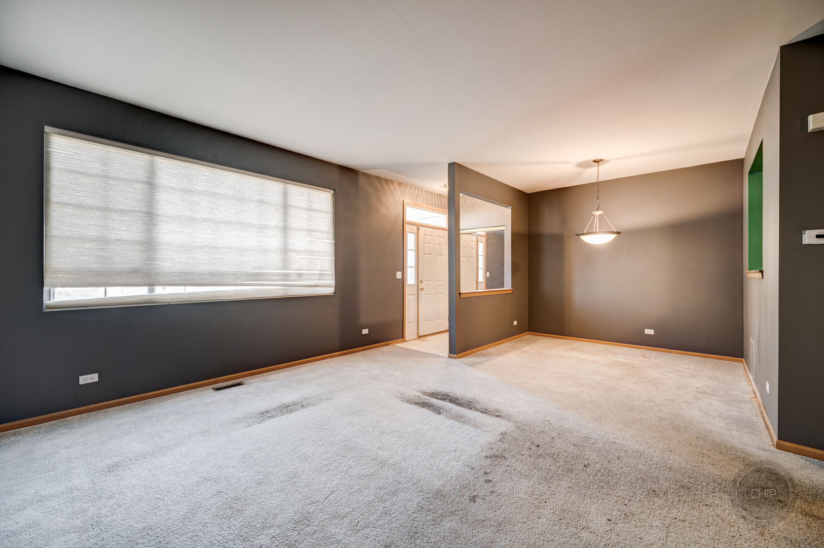 752 County Line Road Aurora, IL 60502 - Photo 6 of 30 a view of an empty room with a window