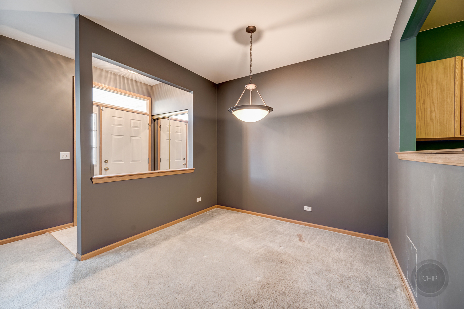 752 County Line Road Aurora, IL 60502 - Photo 8 of 30 a view of an empty room with a window and chandelier fan