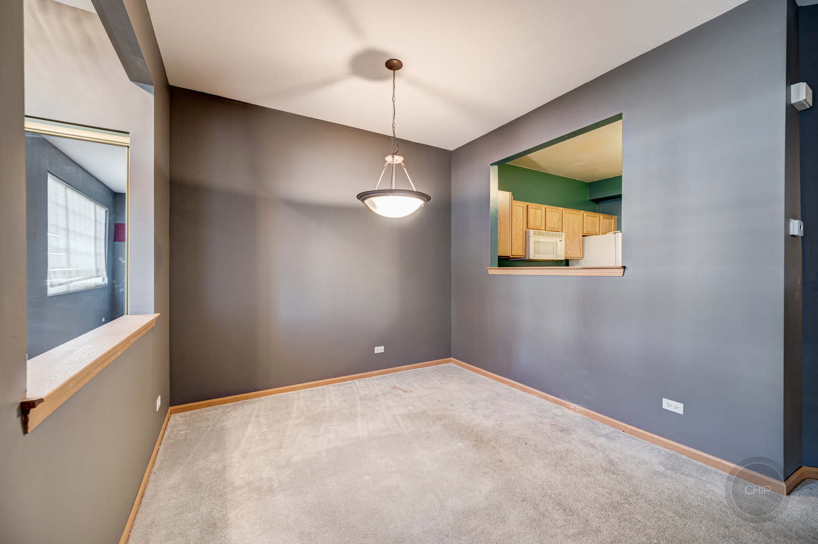 752 County Line Road Aurora, IL 60502 - Photo 9 of 30 a view of an empty room with a window