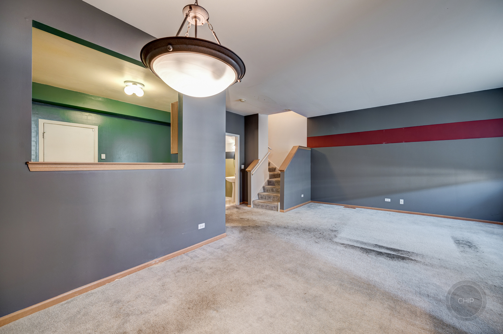 752 County Line Road Aurora, IL 60502 - Photo 10 of 30 a view of a livingroom with a staircase