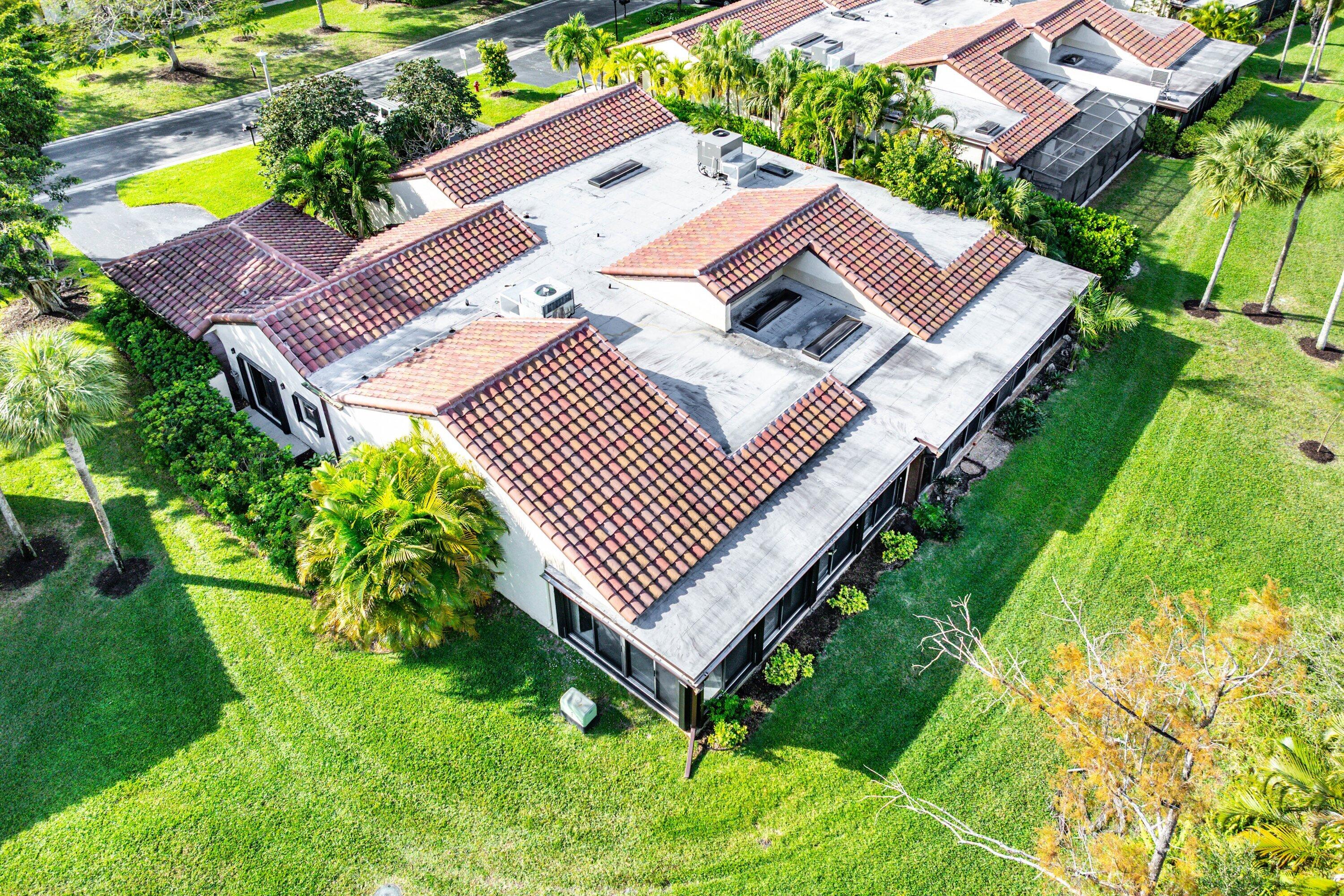 21720 Arriba Real, Unit 37B Boca Raton, FL 33433 - Photo 37 of 41 an aerial view of a house with a garden
