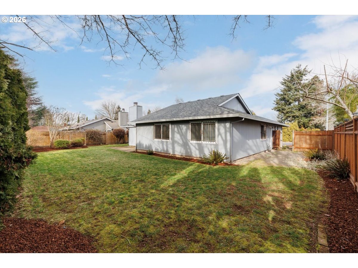 12790 Southwest Cleveland Bay Lane Beaverton, OR 97008 - Photo 25 of 32 a view of a yard in front of a house