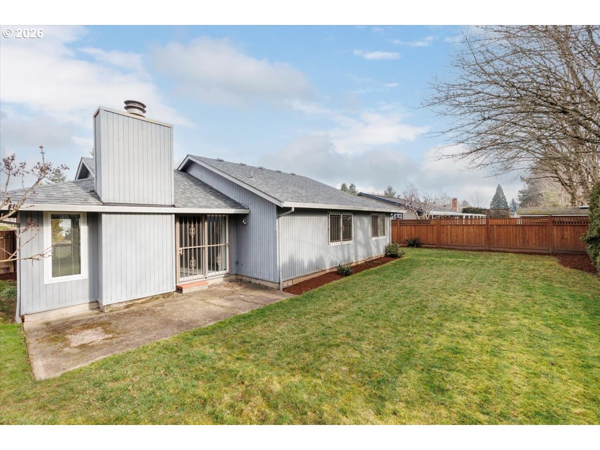 12790 Southwest Cleveland Bay Lane Beaverton, OR 97008 - Photo 27 of 32 a view of a backyard of the house