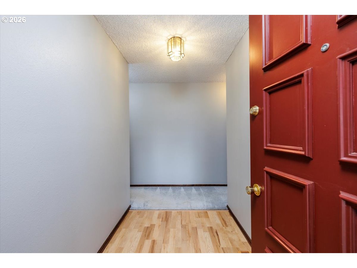 12790 Southwest Cleveland Bay Lane Beaverton, OR 97008 - Photo 5 of 32 a view of wooden floor