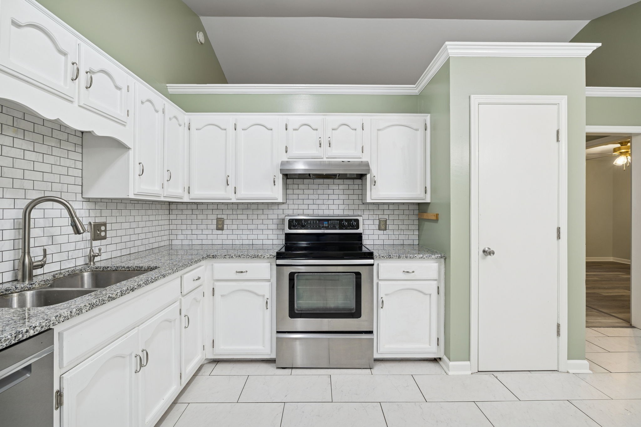 350 State Street Cookeville, TN 38501 - Photo 19 of 44 a kitchen with cabinets a stove and a sink