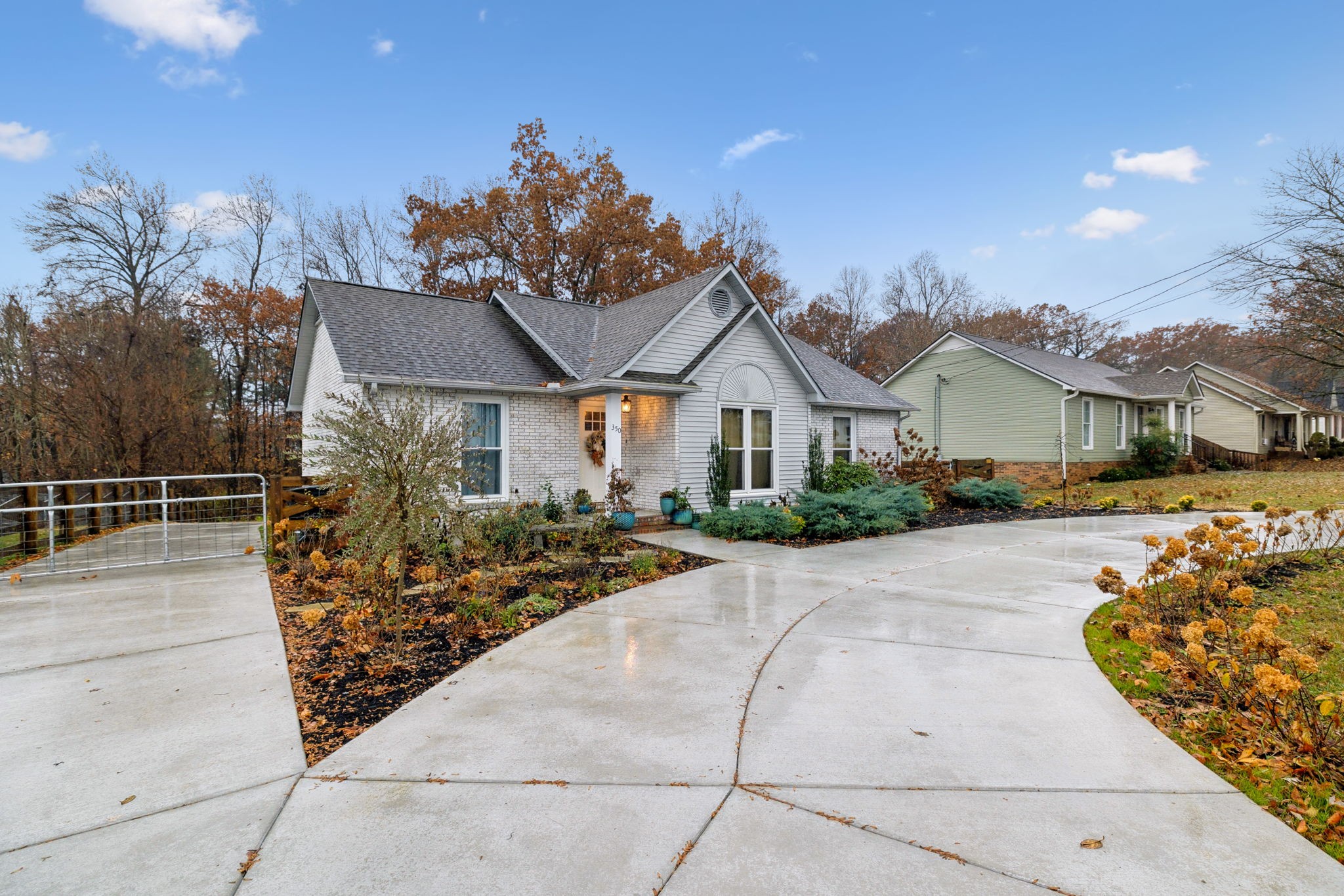 350 State Street Cookeville, TN 38501 - Photo 2 of 44 a front view of a house with garden