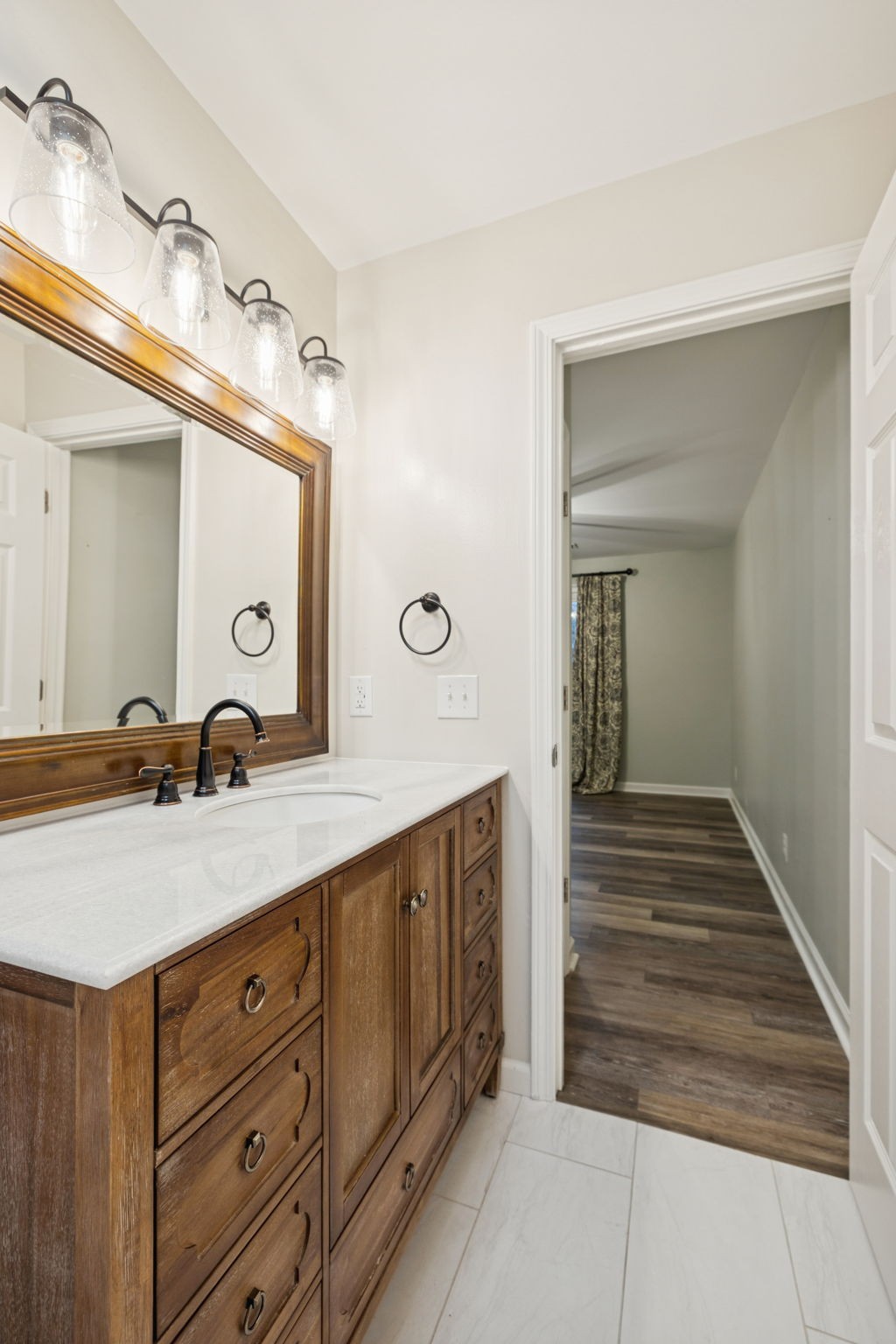 350 State Street Cookeville, TN 38501 - Photo 29 of 44 a spacious bathroom with a double vanity sink and a mirror