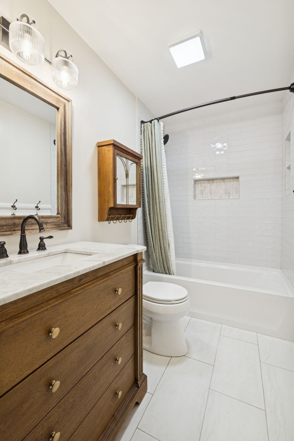 350 State Street Cookeville, TN 38501 - Photo 33 of 44 a bathroom with a granite countertop sink toilet and shower