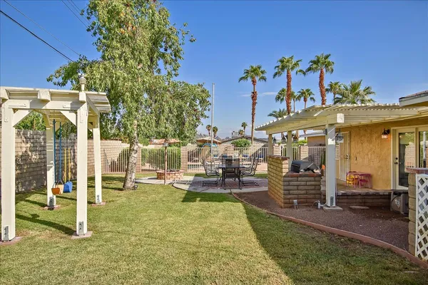 an outdoor space with lots of swings and slides