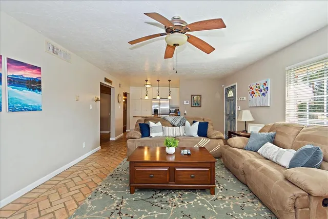 a living room with furniture and a window