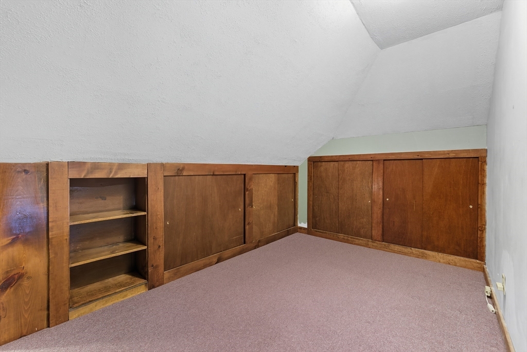 60 Barrison Street Springfield, MA 01109 - Photo 16 of 25 a view of an empty room with an empty room and kitchen