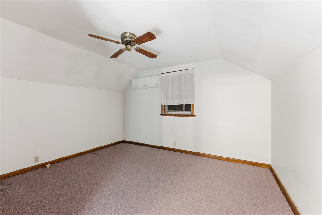 60 Barrison Street Springfield, MA 01109 - Photo 19 of 25 an empty room with a empty space and windows