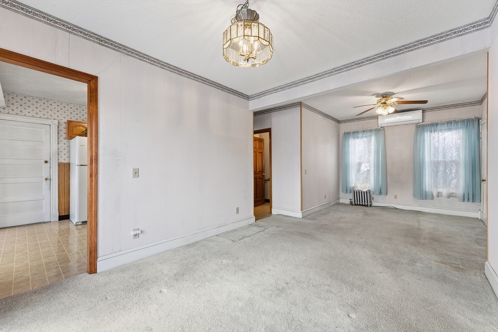 60 Barrison Street Springfield, MA 01109 - Photo 8 of 25 an empty room with windows