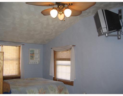 130 Doyle Road Sarver, PA 16055 - Photo 8 of 16 Master Bedroom. Cathedral ceilings in L-shaped master bedroom. TV stays.