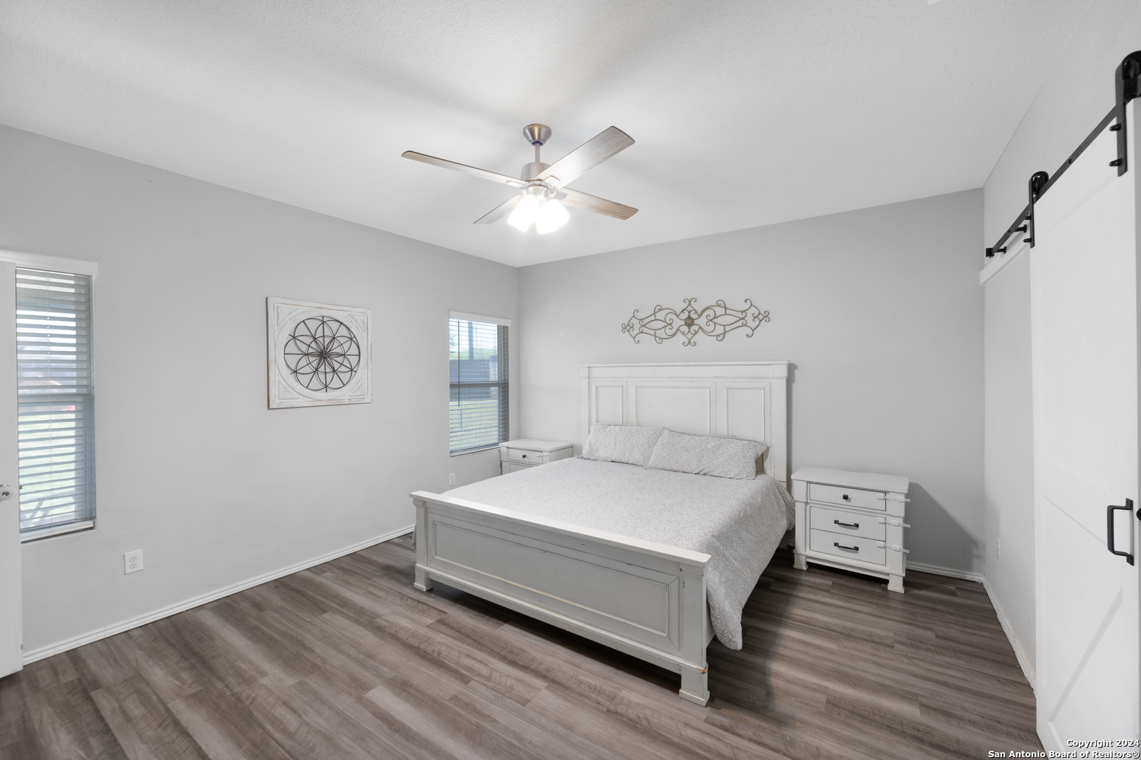 7104 Quarter Moon Converse, TX 78109 - Photo 19 of 28 a bedroom with a bed and a window