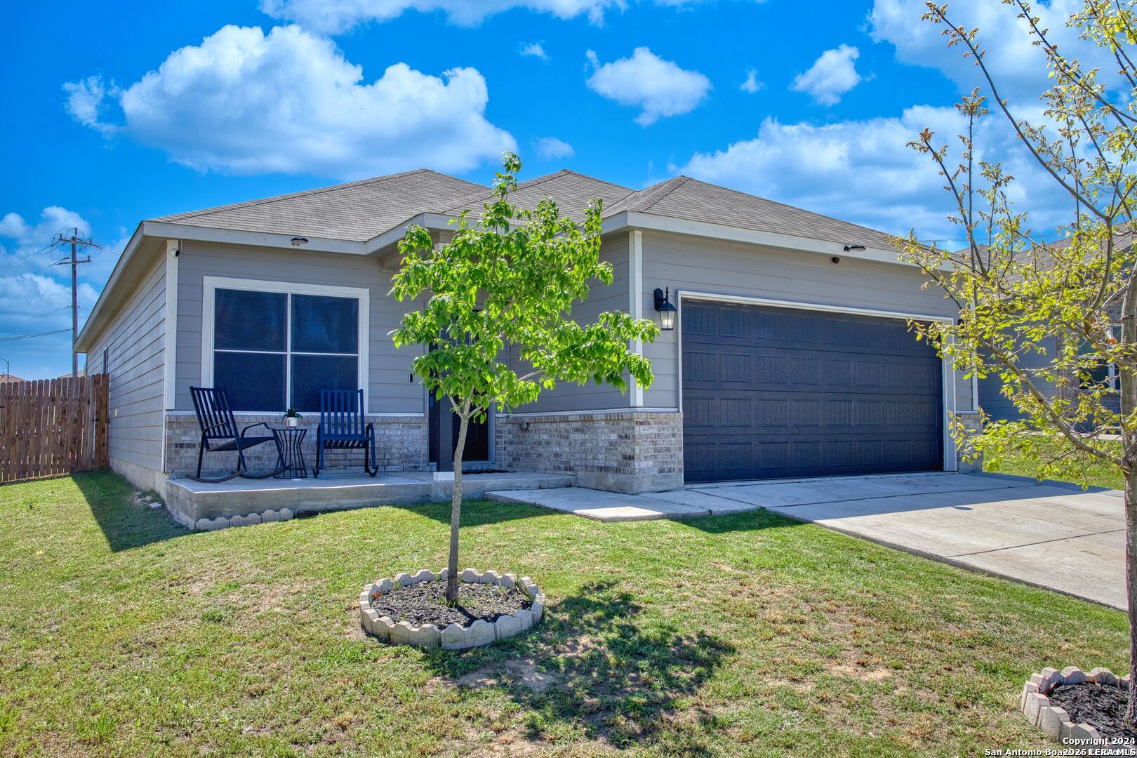 7104 Quarter Moon Converse, TX 78109 - Photo 28 of 28 a front view of a house with a yard