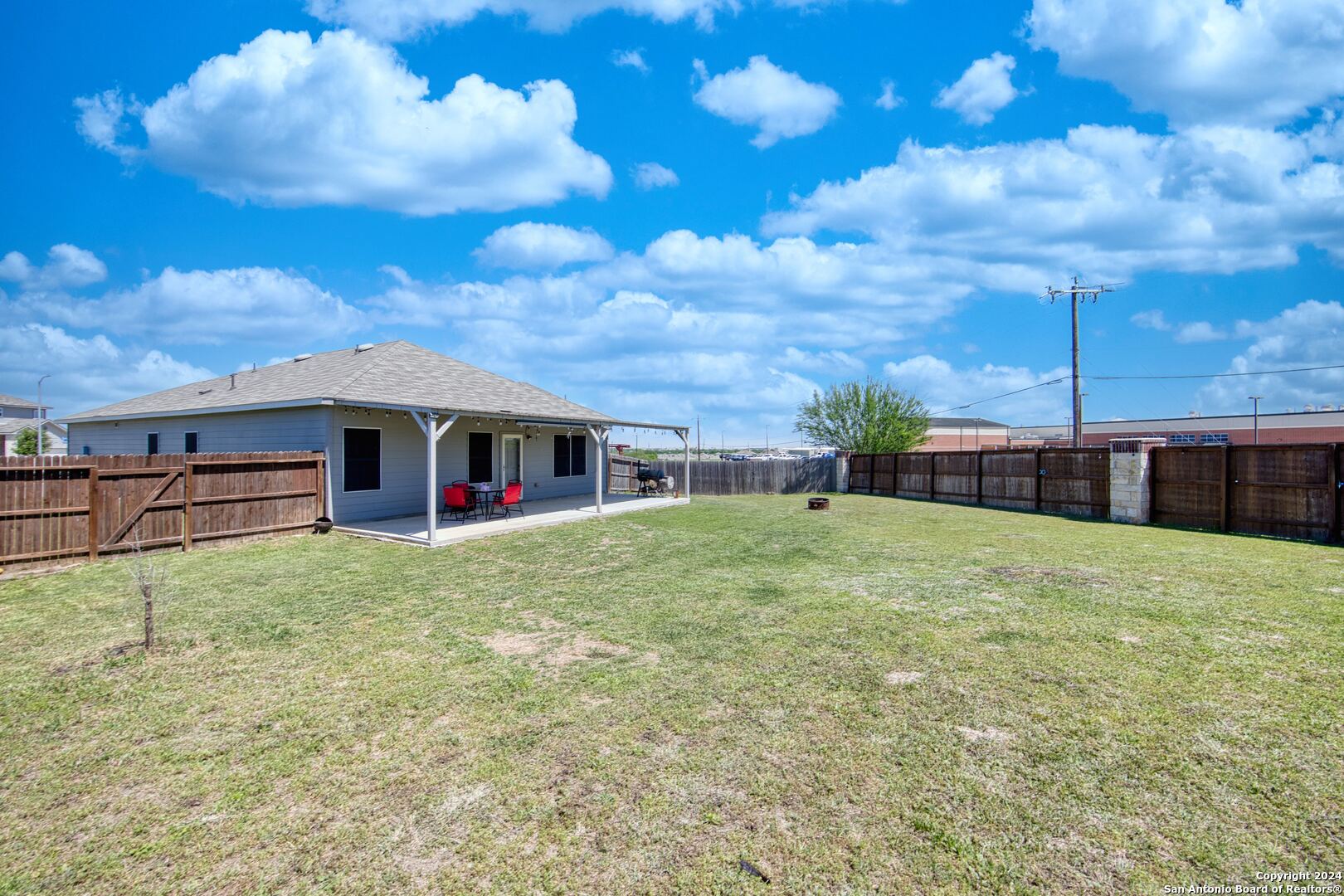 7104 Quarter Moon Converse, TX 78109 - Photo 3 of 28 a view of a house with a backyard