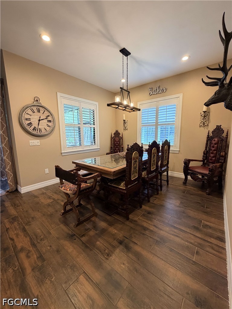190 2nd Street Southeast Naples, FL 34117 - Photo 13 of 47 a living room with furniture and a table