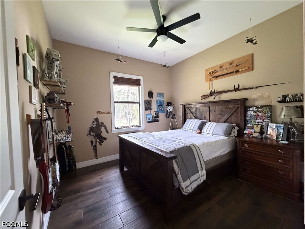 190 2nd Street Southeast Naples, FL 34117 - Photo 17 of 47 a bedroom with a bed and a ceiling fan