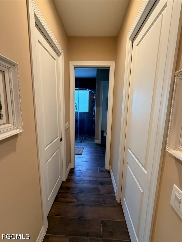 190 2nd Street Southeast Naples, FL 34117 - Photo 28 of 47 a view of a hallway with wooden floor and staircase