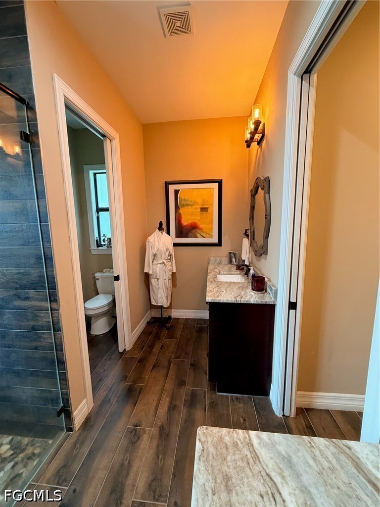 190 2nd Street Southeast Naples, FL 34117 - Photo 31 of 47 a bathroom with a sink and a mirror